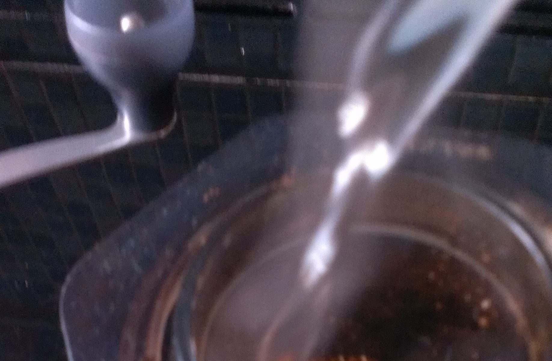 Water pour onto coffee